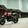 Brixton_Crossfire-125-XS -orange_sideview