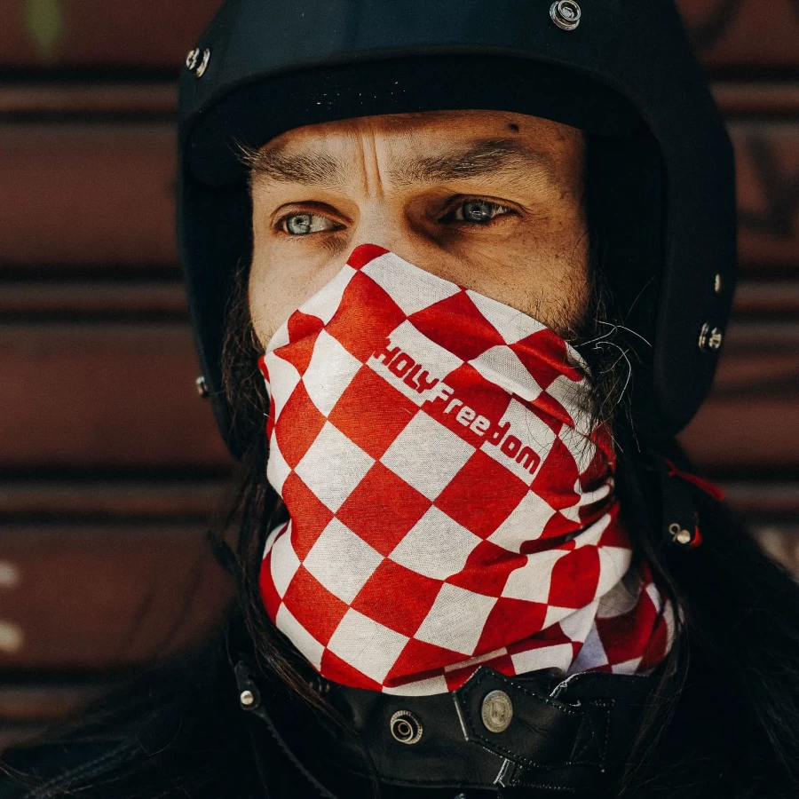 HolyFreedom neck gaiter — motorcycle rider on cold November motorway wearing wind protection tubular