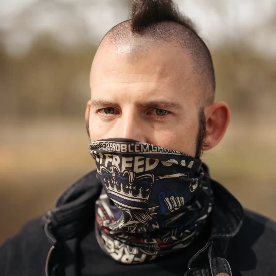 Motorcycle rider wearing HolyFreedom neck gaiter on motorway in cold weather